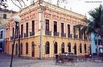 Construdo no final do sculo XVIII, o local teve sua fachada reformada no estilo historicista, no final do sculo XIX, para se tornar Palcio Mathias Bhn, rico comerciante alemo, que se estabeleceu em Paranagu. O Palacete Barbosa era comrcio forte da Rua da Praia. Foi ocupado pela antiga Agncia de Rendas, atualmente abriga a estao Nutica e posto de informaes tursticas.  Palavras-chave: relaes culturais, patrimnio histrico, Paranagu, Palcio, Centro Histrico, arquitetura neoclssica.  